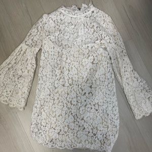 Lace higher neck, zip up dress.